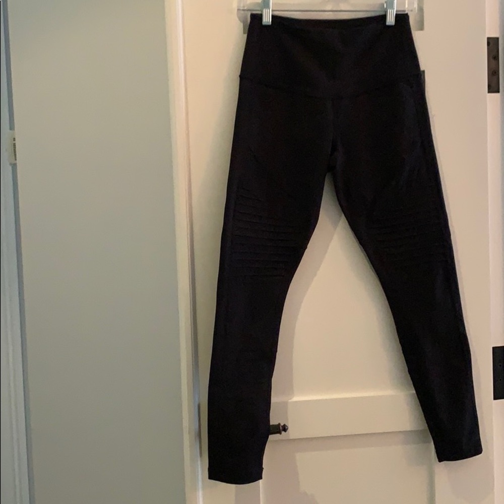 Black Zella high waist moto ankle leggings.
